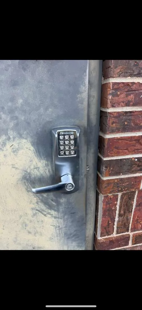 Commercial keypad lock installed on a steel door by Locksmith Solutions OKC — Oklahoma Lic #441138